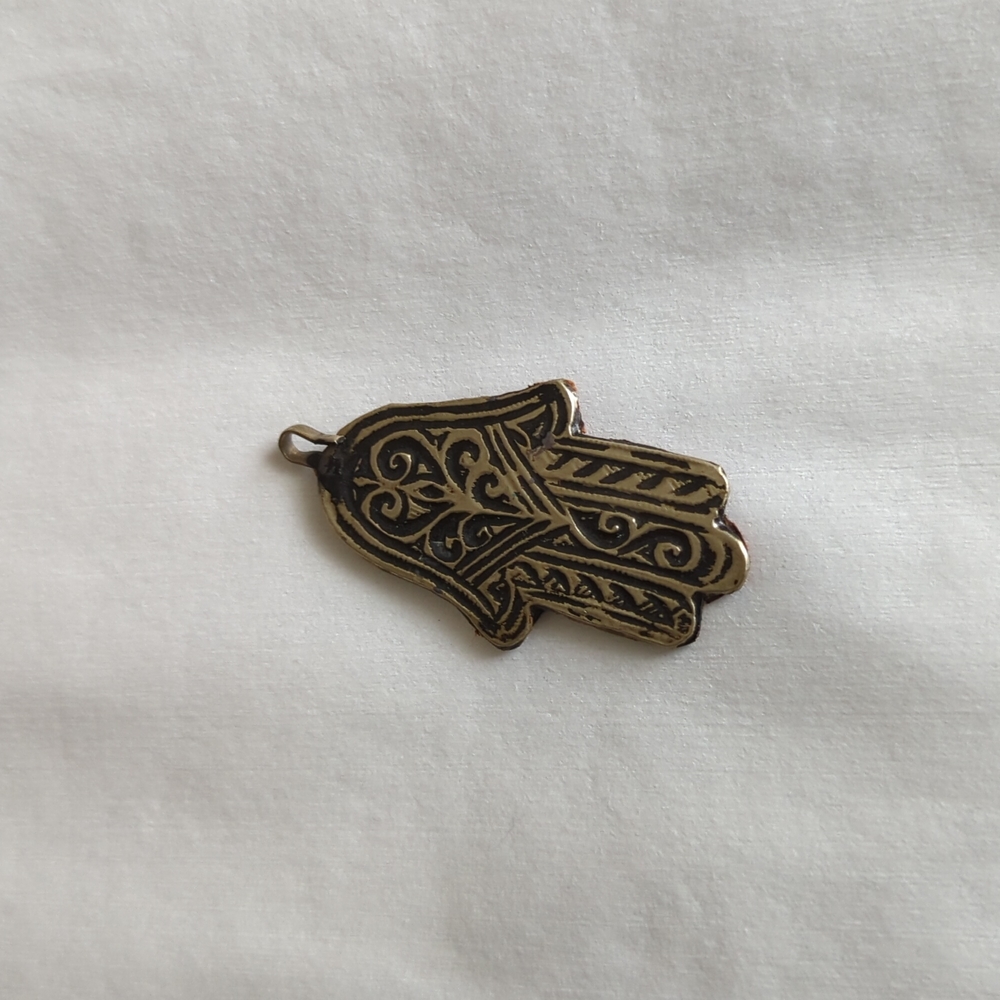 Hamsa hand charm for necklace purchased in Nepal